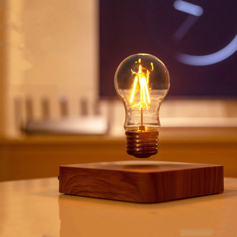 Creative Minimal Self-rotating Wireless Powered Maglev Bulb