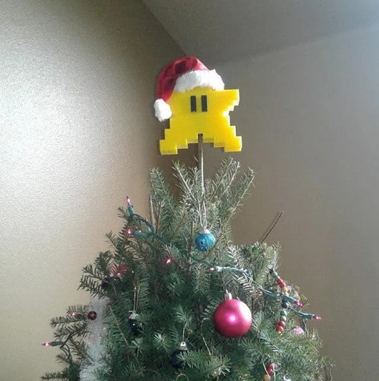 Decoración de árbol de Navidad con forma de estrella de mar y píxeles