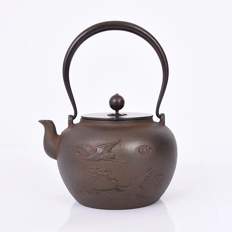 Cast Iron Embroidered Teapot Boiling Water