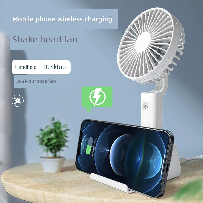 Pequeño ventilador eléctrico de escritorio para acampar al aire libre, ventilador de escritorio portátil de doble uso, Base de cargador inalámbrico para teléfono móvil, cabezal móvil automático