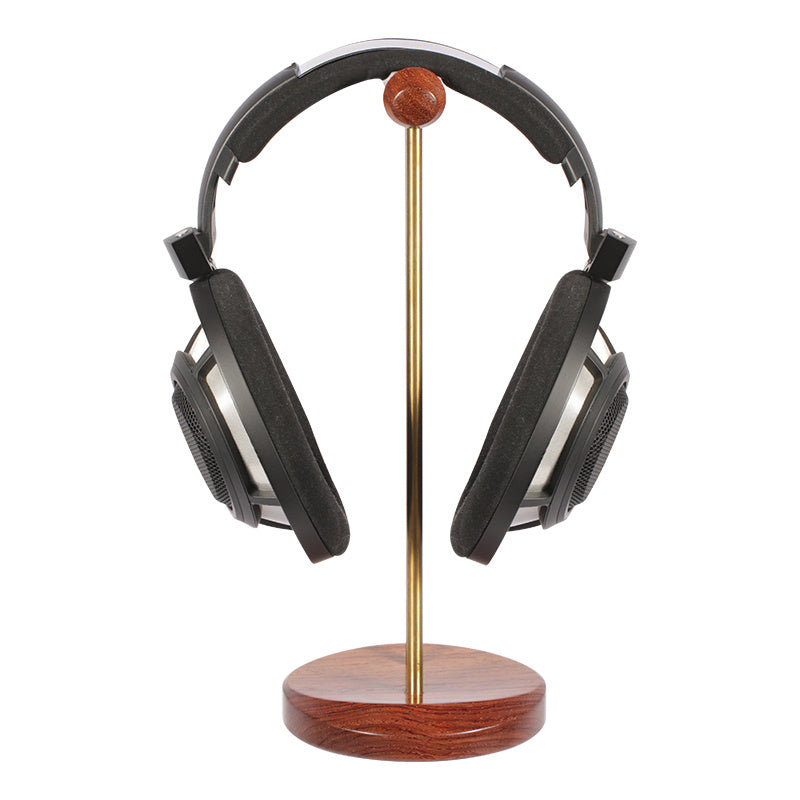 Auriculares de madera maciza con soporte de metal.