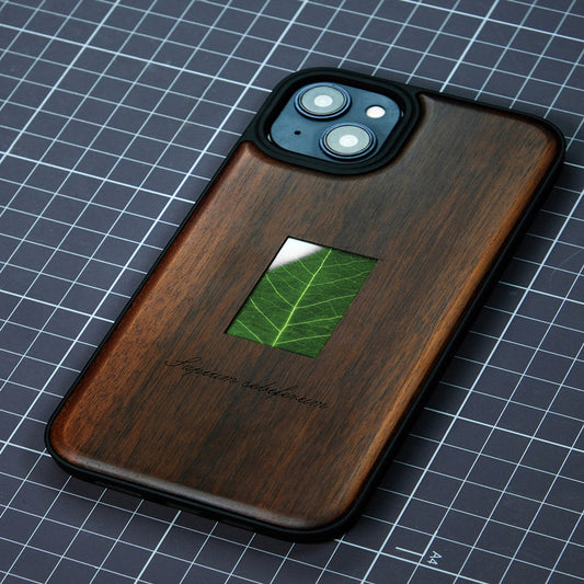 Étui de téléphone en bois massif avec spécimen de plante